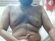 Indian hairy guy masturbating in a bathroom