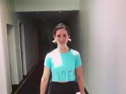 Alison Brie doing a Farmer Walk exercise