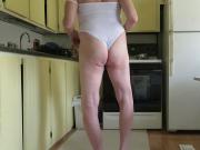 Leotard sissy shows his fem ass cheeks and boner bulge.