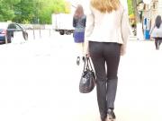 Young woman ass in black pants