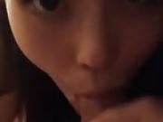 Chinese girl talking while sucking dick