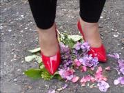 Flowers crush in red heels