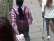 Amputee Chinese Girl Down Stairs With Crutches