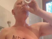 NRR slave Wolfgang drinks and reviews his morning urine