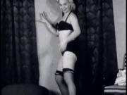 Vintage Blond women in a black bra