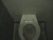 Wank and cumshot in motorway toilet