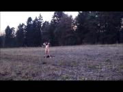 standing naked in the field