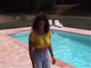 Marjorie is getting wet in her pool - outdoor