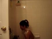 SEXY BRUNETTE TOPLESS SHOWERING DANCING