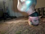 hung by her ankles in the yard