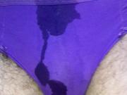 Pissing in freshly cum stained purple panties