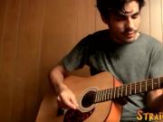 Handsome young man enjoys his guitar and jerkoff solo