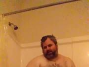 Chubby man in the shower