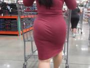 Asian MILF hottie with a smokin body in a tight dress