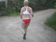 Granny jogs topless