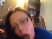 Sexy white chick with glasses sucking black dick