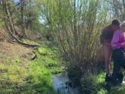 couple walk outdoors have a anal piss fuck by a stream