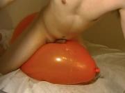 Big inflatable orange balloon humping cum