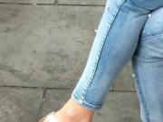 Candid feet at bus stop