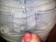 Cumming on her loose Levis