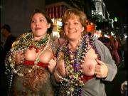 Two busty bitches flashing tits at Mardi Gras