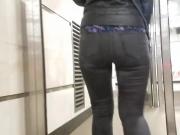 Girl's ass in tight jeans