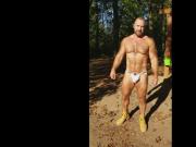 Posing for photographer in jock at campground