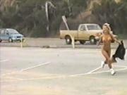 Marilyn Star does naked cartwheels by busy road