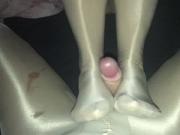 Shiny pantyhose footjob