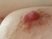 feel her hard ripe nipple on her big tit