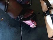 Domina Frankie trampling on a slave's cock