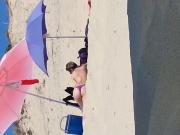 Spying on a hot MILF on Biscorosse Beach France