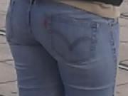 Ass in tight Jeans waiting tramway