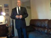 Wank in suit