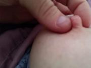 playing with her tired ripe titty & nipple.