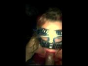 Wearing a mask and sucking a fat one