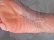 feet wrinkled
