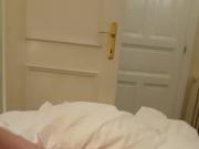 Jerking off in a hotel bed