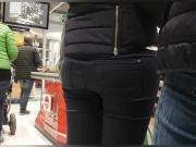 Black jeans ass blond girl at check out line