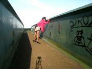 In the pink on a bridge