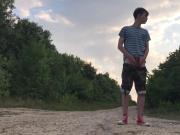 Teenager jerking off on a dusty road