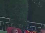 Old couple by the pool