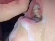 Mouth full of cum