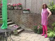 In chastity wearing Hot Pink Thigh Boots