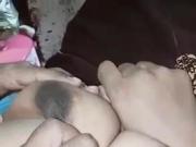 Pressing very hard on my aunt's boobs