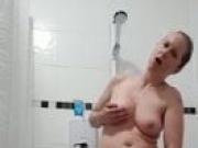 British Milf using toy in shower cums and sucks it clean