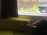 Wife giving risky blowjob in front of window in a camper van