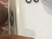 Horny teen jerks off and cums in the bath