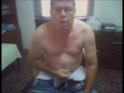 Latin daddy wanking his meat