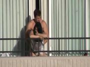 Cute milf caught getting fucked on a hotel balcony